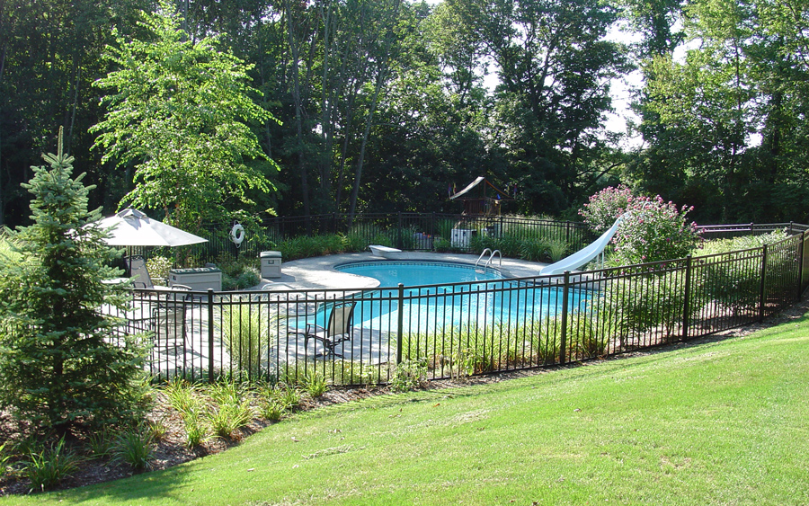 Decorative fence project around a residential pool setting